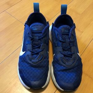 Nike boys shoe size 12. Barely worn. Elastic laces for easy slide on